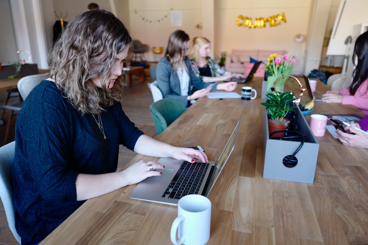 Two women checking a social media campaign.