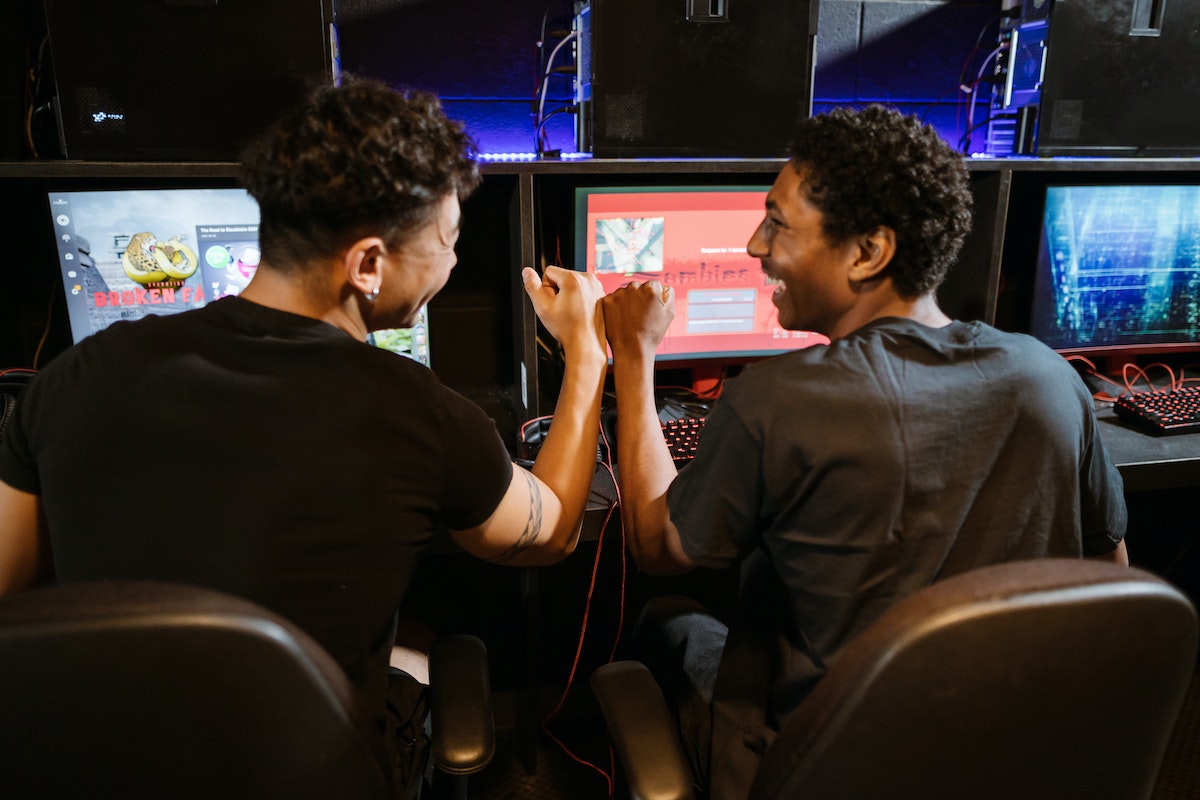 Two men playing computer games.
